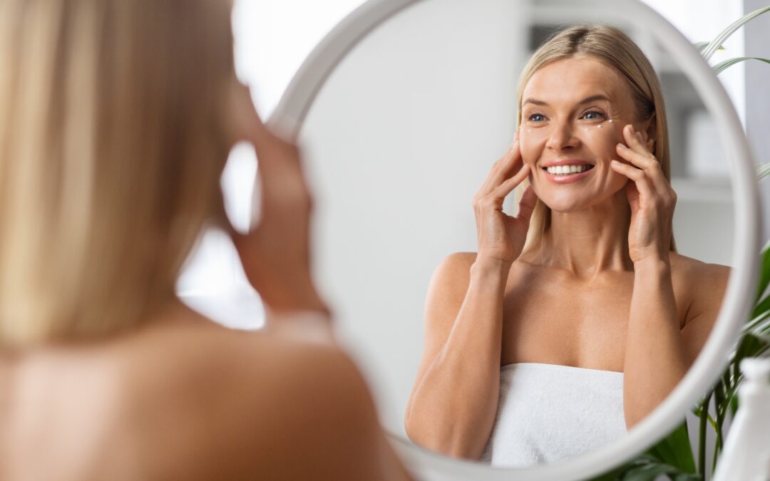 Anti-aging,Cosmetics.,Beautiful,Middle,Aged,Woman,Applying,Eye,Cream,While